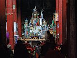 Lo Manthang Thubchen 01-2 Main Assembly Hall Guru Rinpoche Padmasambhava Statue I visited Thubchen gompa in Lo Manthang several times each day. A lone young monk banged a drum at 6 am to invite the rest of the monks to arrive at the Thubchen gompa by 6:30 each morning for prayers. The main statue in the assembly hall at Thubchen gompa in Lo Manthang is Guru Rinpoche (Padmasambhava).